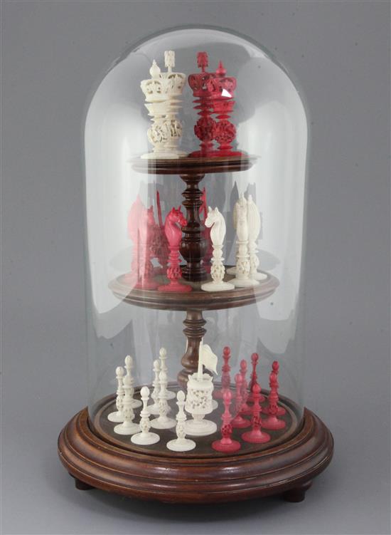 A 19th century Burmese carved and stained ivory chess set,